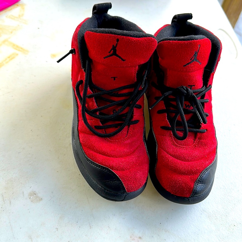 Youth size 2.5 Black and Red Jordan’s